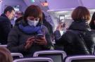 Люди в масках на борту самолета Airbus A350